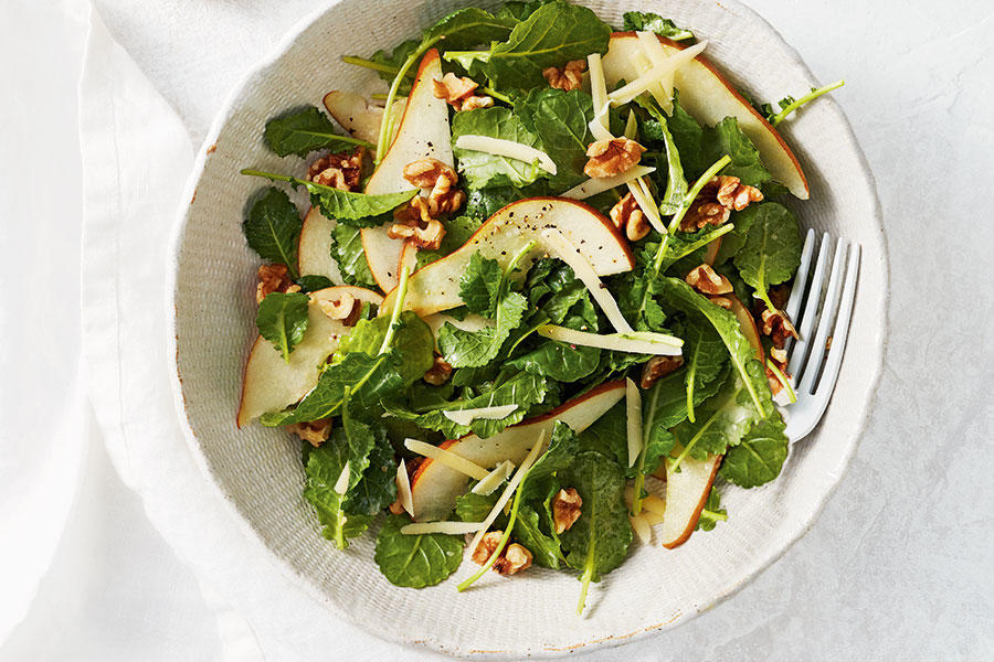 Baby kale and pear salad with mustard walnut vinaigrette