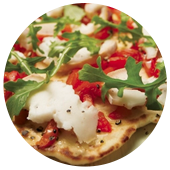 GRILLED PEPPER GOAT CHEESE AND ARUGULA NAAN PIZZA