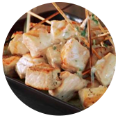GRILLED SWORDFISH SKEWERS WITH COCONUT, KEY LIME AND GREEN CHILE SAUCE 